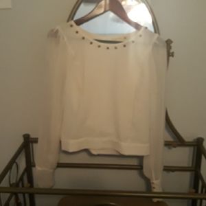 A mid drift studded blouse